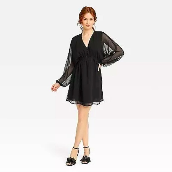 a new day Dresses & Skirts - SHEER SLEEVE LITTLE BLACK DRESS